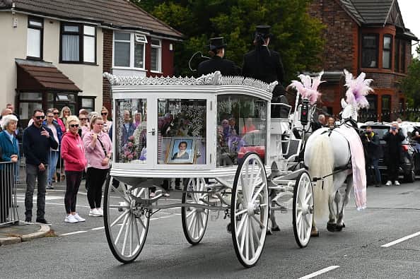 Mourners watch the Funeral Cortege of Olivia Pratt-Korbell arrive at St Margaret Mary’s Church on September 15, 2022 in Liverpool. Photo by Richard Martin-Roberts/Getty Images)