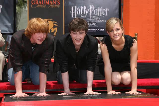 Cast members from Harry Potter (from left) Rupert Grint, Daniel Radcliffe and Emma Watson (photo: Alberto E. Rodriguez/Getty Images)
