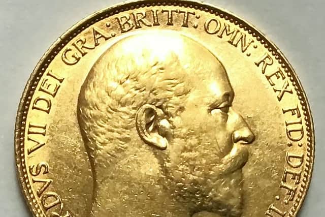 A secret hoard of more than 1,000 historic coins found hidden in shoe boxes at a late businessman's home has fetched nearly £21,000 at auction.