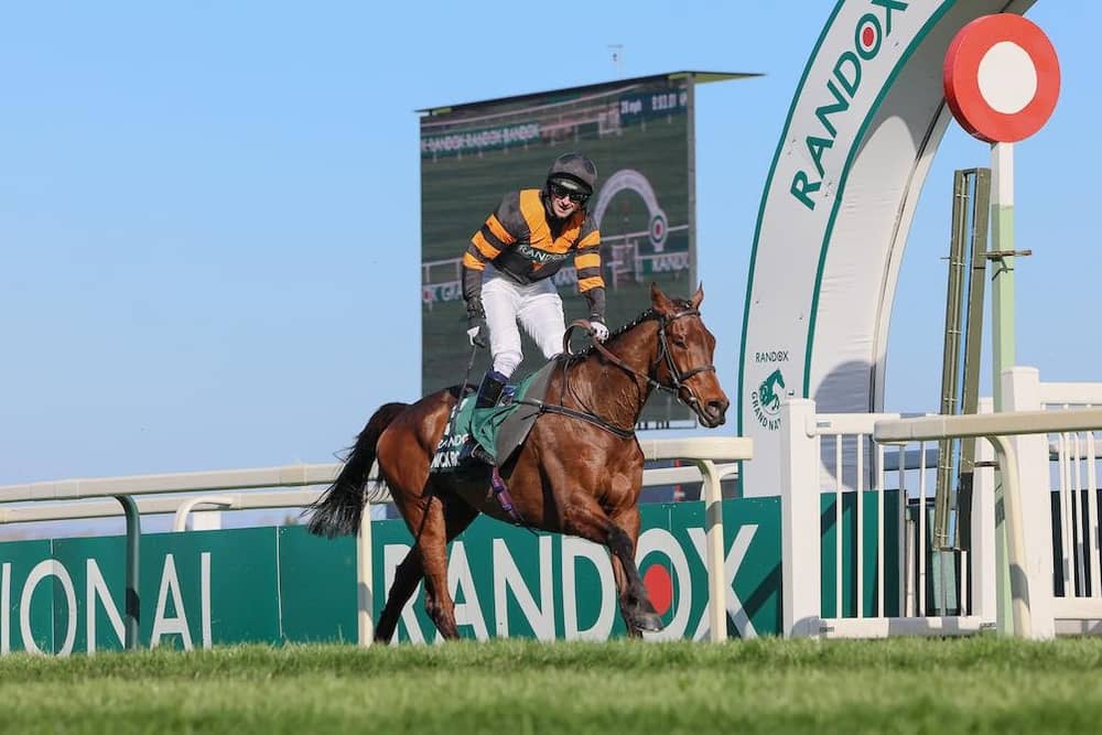 Patrick Mullins winning the 2025 Grand National on board Nick Rockett at Aintree for his dad Willie Mullins. 