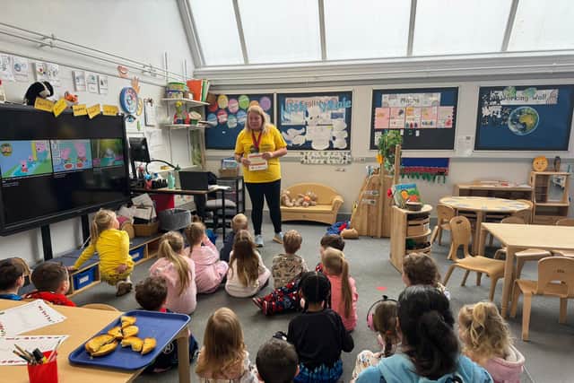 Justyna Majer, Bolsover District Council Community Rail Officer using World Book Day to teach youngsters about the dangers of the railway