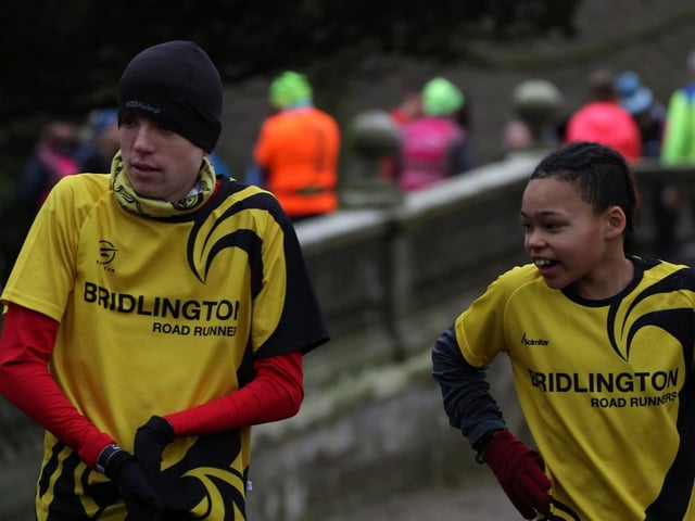 Two young Bridlington Road Runners take time to get their breath back after the finish of the Sewerby Parkrun
Photos by TCF Photography