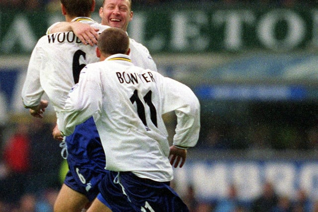 David Batty and Lee Bowyer celebrate with goalscorer Jonathan Woodgate.