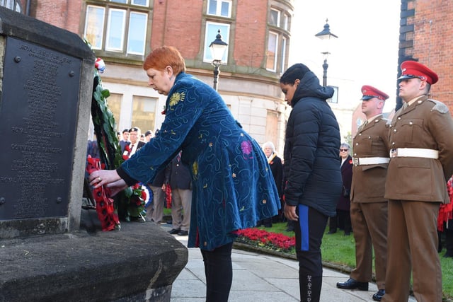 Melanie Bryan OBE Greater Manchester deputy Lieutenant lays a wreath.