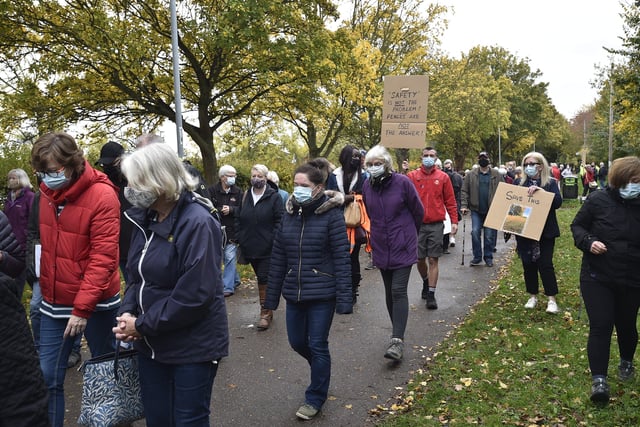 Werrington residents pictured at a protest against a fence being erected around the playing fields behind Ken Stimpson School in 2020.