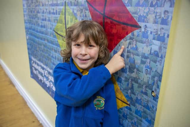 There I am! Hillside Primary & Nursery School pupil Noah has found his picture on the new banner