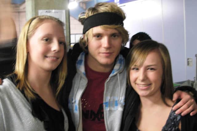 Abbie Sims, left, meeting Dougie Poynter of McFly in 2009.