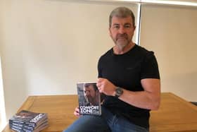Former Nottinghamshire Police officer Nick Holmes, pictured with his book 'Comfort Zone'.
