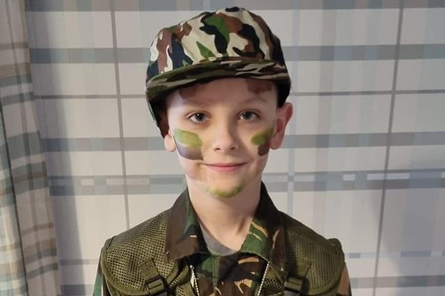 Logan as a soldier from Toy Story.