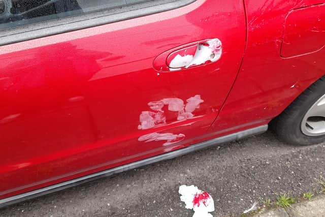 The paintwork has been stripped from this vehicle by a suspected acid