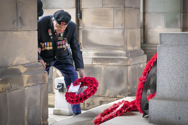 101-year-old Second World War veteran Jack Ransom lays a wreath during the Remembrance Sunday service at the Stone of Remembrance outside Edinburgh City Chambers in Edinburgh.