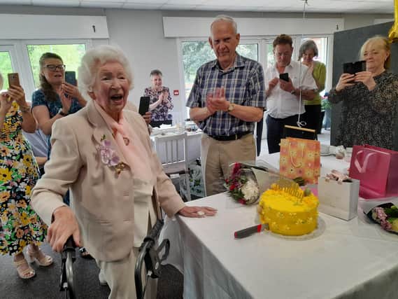 Laurie Carter is the centre of attention during celbrations for her 104th birthday