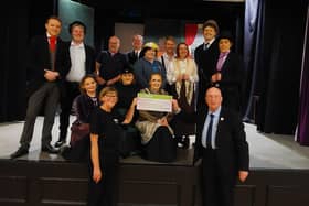 Coun John Wilmott presents the cheque to Lovelace Theatre Group of Hucknall