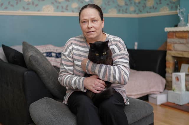 Zoe Foster from Hucknall, with her cat Gizmo who was found after six years on the run.