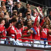 Forest skipper Joe Worrall lifts the trophy following their win over Huddersfield Town in in the EFL Championship play-off final. Photo: Mike Hewitt/Getty Images