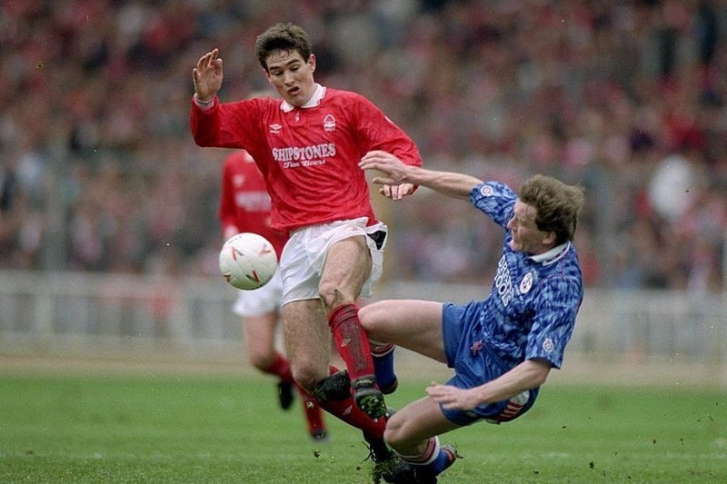 Nigel Clough is tackled by Kevin Moore during the Zenith Data Cup final at Wembley Stadium on 29 Mar 1992. Forest won the match 3-2.