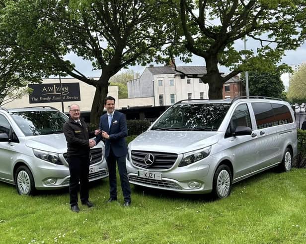 Mertrux sales controller Frank Murray hands over the vehicles to Matthew Lymn Rose, AW Lymn managing director. (Photo by: AW Lymn The Family Funeral Service)