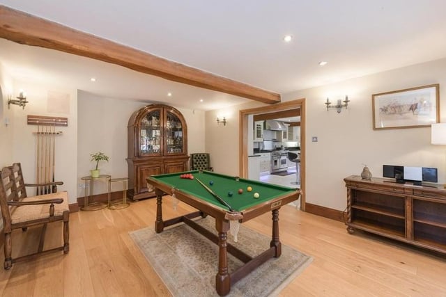 The dining room is so sizeable that there is even space for a pool table. Fancy a quick game before dinner?