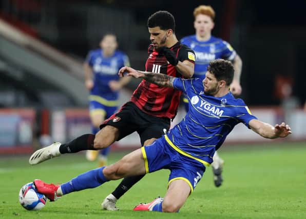 Dominic Solanke collides with Tobias Figueiredo during Nottingham Forest's 2-0 defeat at Bournemouth.  (Photo by Naomi Baker/Getty Images)