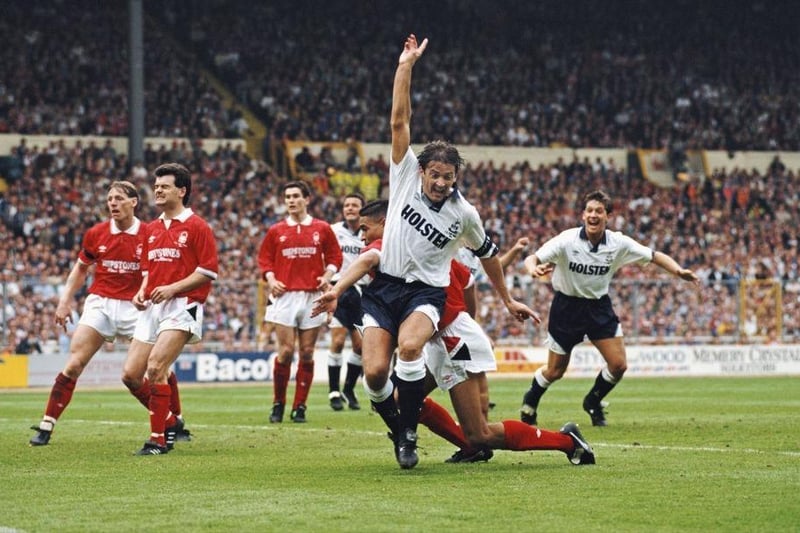 Spurs captain Gary Mabbutt (2nd r) and Gary Lineker (r) celebrate as Forest defender Des Walker (partially obscured) scores an own goal to give Tottenham a 2-1 lead as Forest players from left to right, Stuart Pearce, Steve Hodge, and Nigel Clough react during the 1991 FA Cup Final.