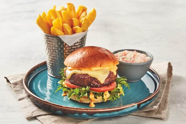 A classic cheeseburger with chips and coleslaw is one of the weekday evening meals Morrisons will be offering for less than a fiver