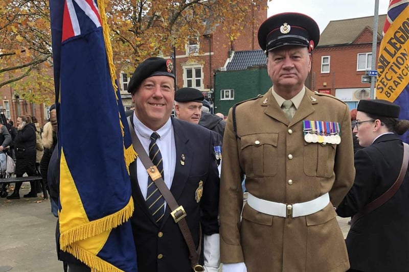Standard bearers and military representatives standing proud ahead of the Hucknall parade. Photo: Lockie Laughland