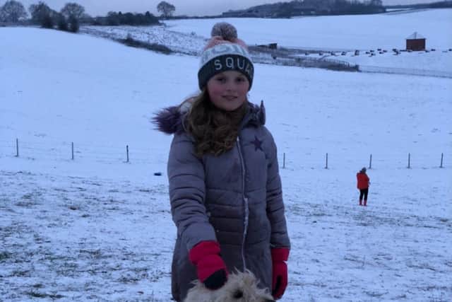 Olivia Stenson enjoying a snow day on the picturesque Misk Hills
