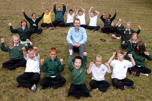 2006: Pupils at Rufford Junior School celebrate their great Ofsted results, along with acting head Chris Tupling.