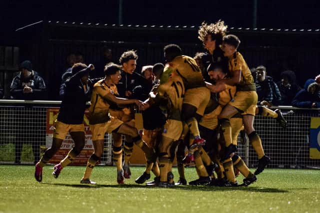 United's youngsters celebrate. Photo: Craig Lamont