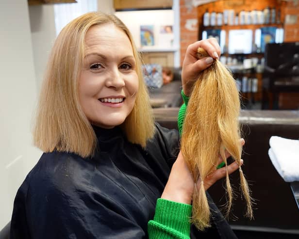 Kayte Baxter with her cut hair ready to be sent to the Little Princess Trust