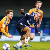 Stephen Quinn (left) in Stags loan action.