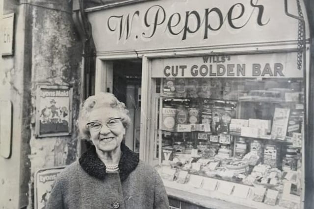 Hilda Pepper outside the shop she founded