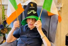 A resident celebrates St Patrick's Day at Bulwell's Hall Park Care Home.