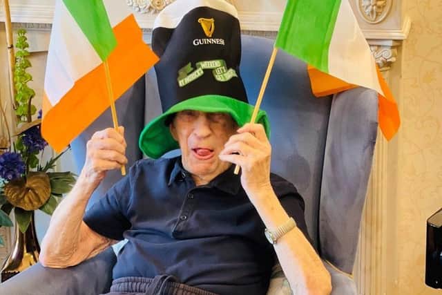 A resident celebrates St Patrick's Day at Bulwell's Hall Park Care Home.