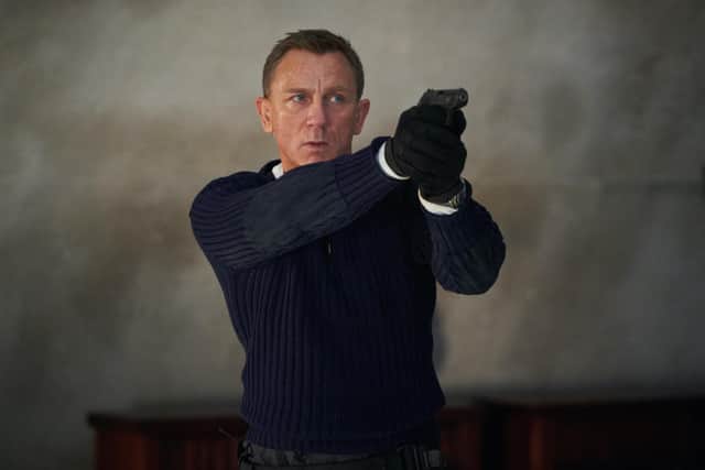 Daniel Craig stars as James Bond in No Time To Die. Photo: Nicola Dove