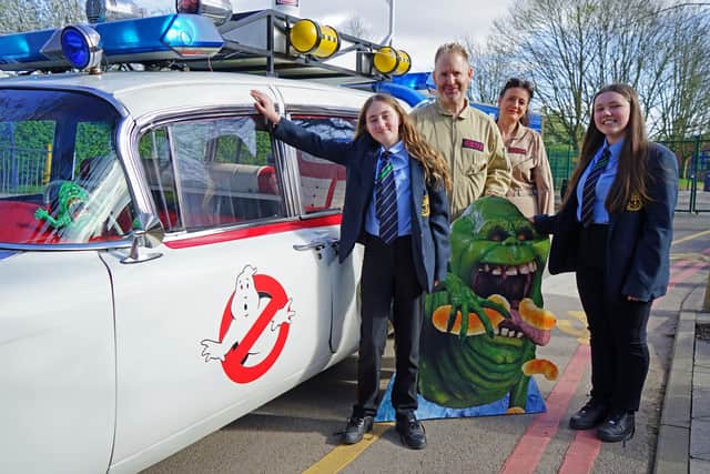 Gemma Alexander and her friend Olivia Dean with the Ghostbusters outside National Academy. Photo: Brian Eyre