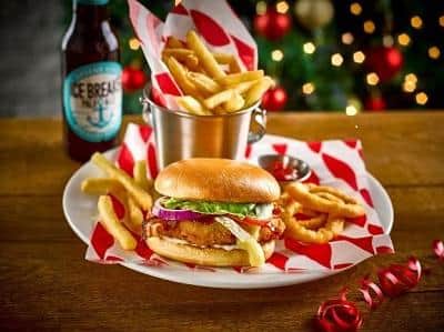 Unwind with family and friends and enjoy great value food and drink, like this festive burger