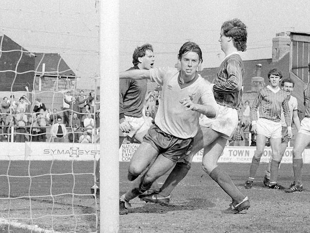 Charlie Bell wheels away after scoring against Tranmere Rovers.