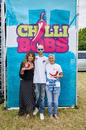 Neal Price with two of the UK's top chilli eating champions