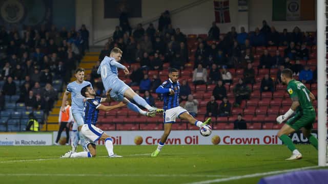 George Maris heads the winning goal at Rochdale. Photo Chris Holloway / The Bigger Picture.media