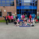 Children and Staff celebrating Applegarth's 18th Birthday