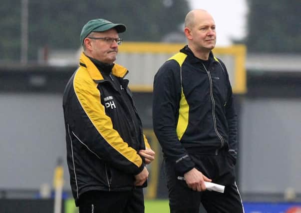 Phil Henry (pictured on the left alongside manager Andy Graves) says upcoming games are key for Hucknall Town.