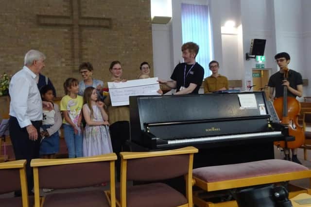 The £500 cheque from The Kynan Eldridge Fund is handed over to members of Hucknall's Torkard Academy. (Photo by: Anne Eldridge)