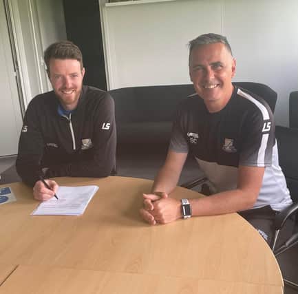 Basford United manager Steve Chettle (right) with new signing Adam Collin who arrives from Kettering Town (image: Basford United Football Club)
