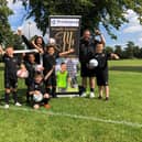 David Lilley with children who took part in his summer football club