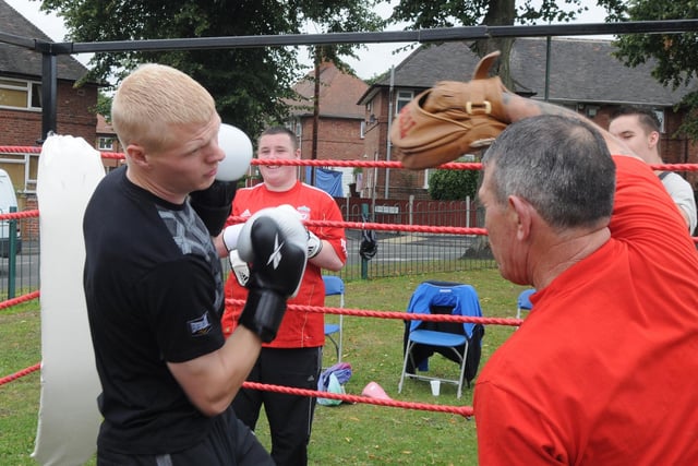 2010: Barry O'Dowd puts Josh Savage through his paces at the Bulwell Hall Estate Community Fun Day.