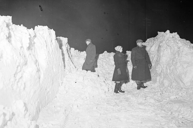 Eight foot snow drifts block Old Lanark Road, near Balerno, in February 1955.