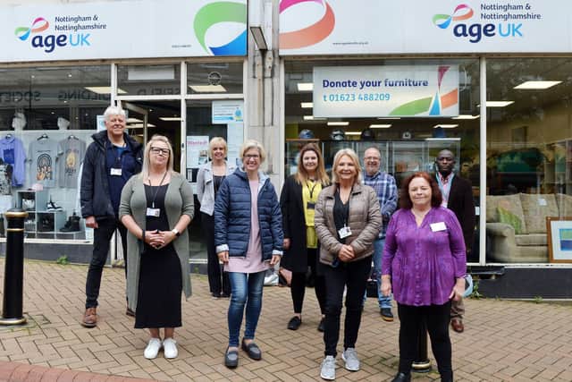 Staff and key Age UK Connect support workers outside the Age UK shop on Regent Street, Mansfield.