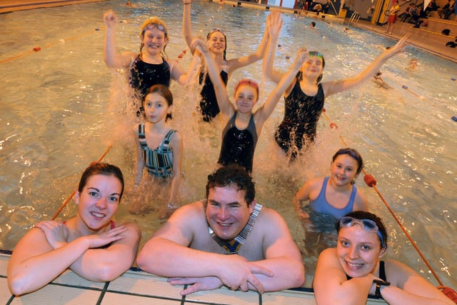 Hucknall Rotary President, Ian Young is joined by members of the 4th and 8th Hucknall Guides at a sponsored swim event at the Leisure Centre in 2013 to raise money for their group along with the Boys Brigade, Framework, the Thursday Club, 1803 Air Cadets and Pyramid Acrobatic Club.