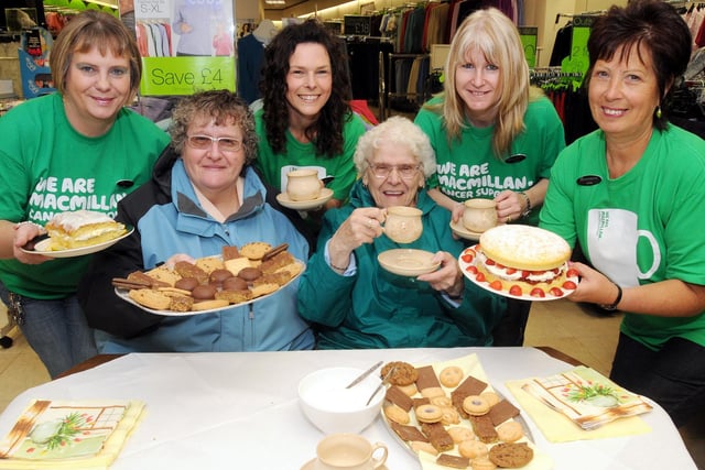 2010:  Staff at the Hucknall branch of Bon Marche put on coffee and cakes for customers as part of the Macmillan Coffee Morning event.